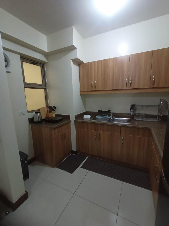 Aparthotel Acacia Estates Taguig à Manille Extérieur photo