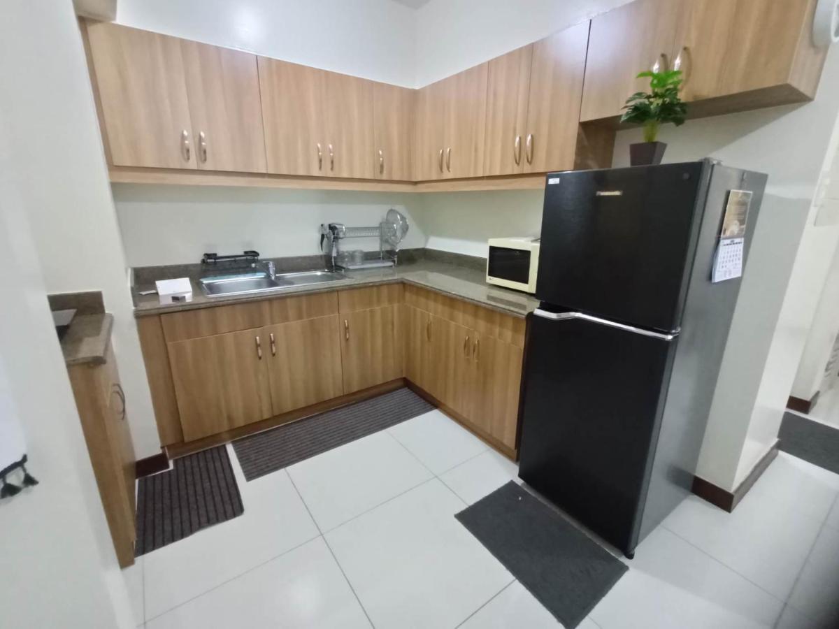 Aparthotel Acacia Estates Taguig à Manille Extérieur photo